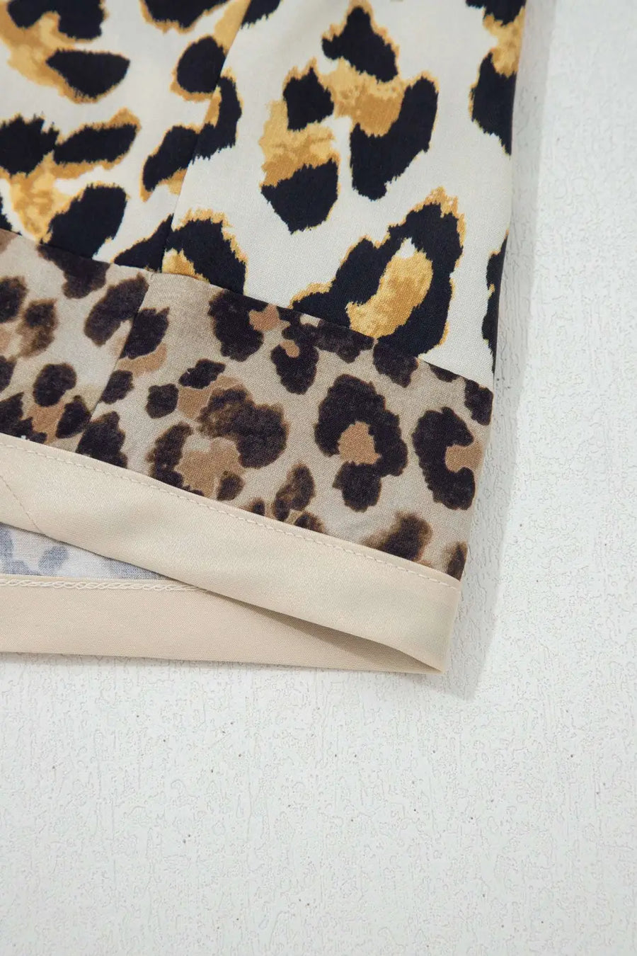 Side view of Leopard Panel Relaxed Shirt showing khaki and leopard patchwork construction — Fashionfitz