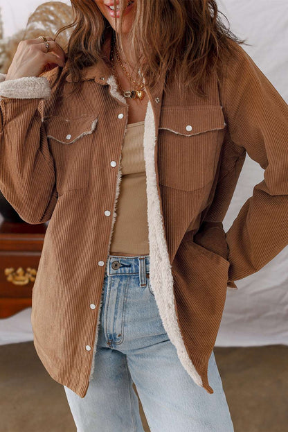 Corduroy Jacket - Fleece Lined in warm brown with snap buttons and chest pockets, styled for casual winter wear.
