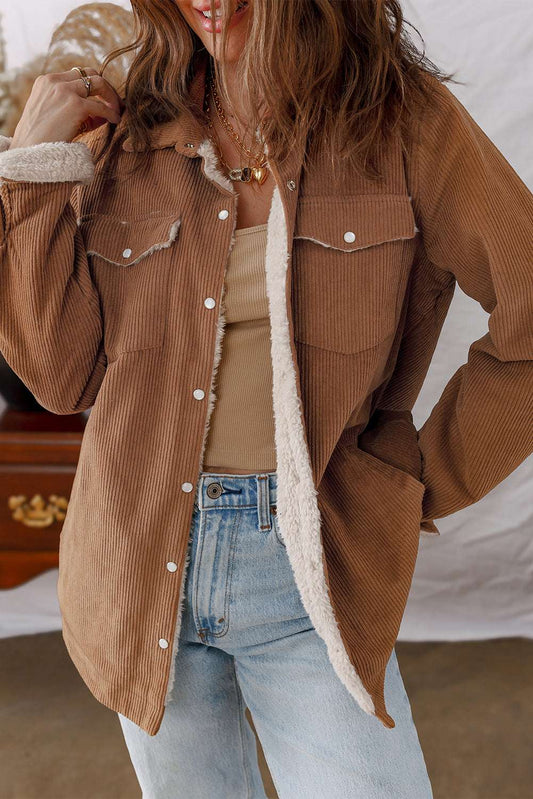 Corduroy Jacket - Fleece Lined in warm brown with snap buttons and chest pockets, styled for casual winter wear.