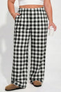 Plaid pattern elastic waist shift plus size trousers in black — front view