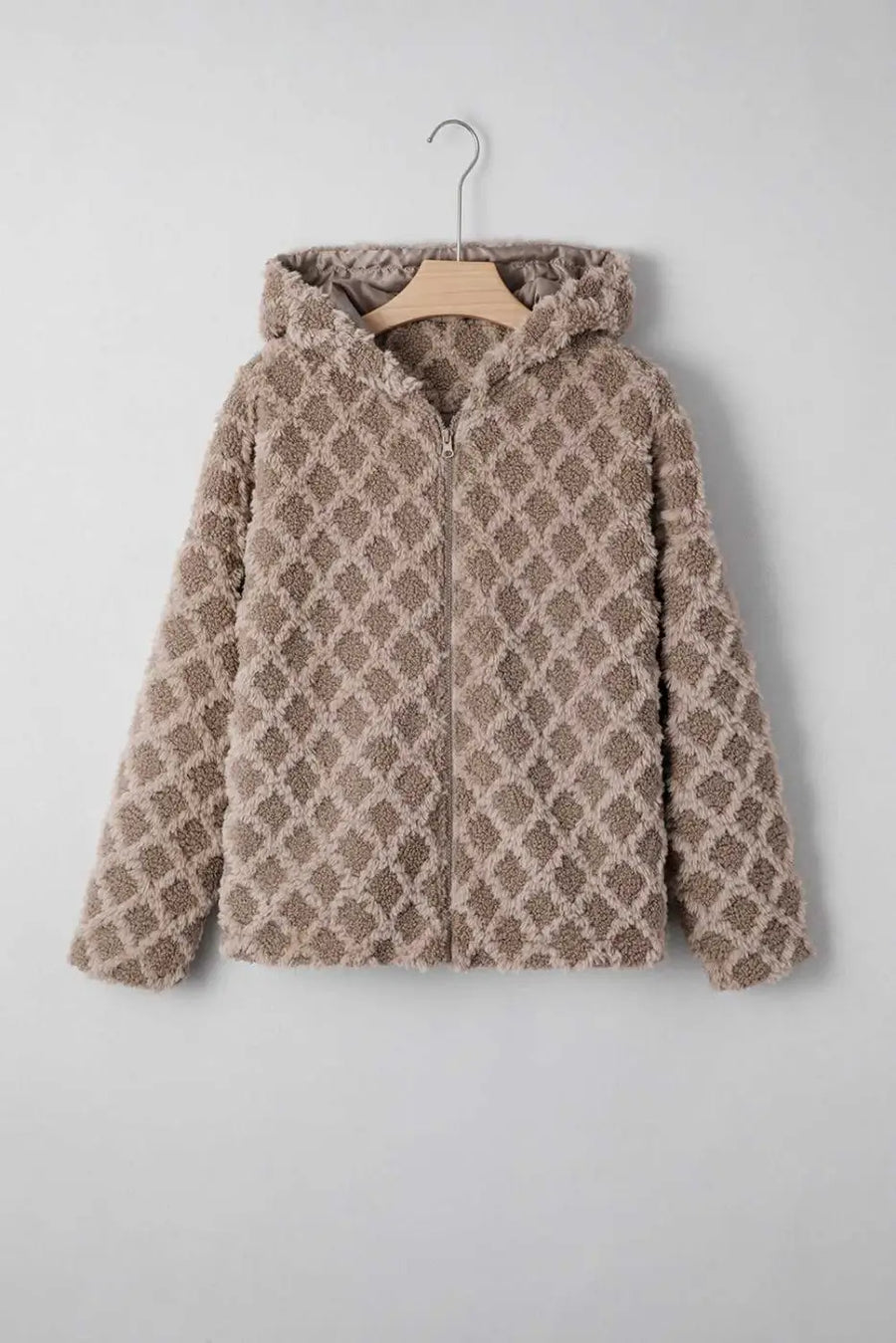 Front view of Camel Sherpa Fleece Jacket on hanger, featuring quilted hood and zip-up design, ideal for cozy and stylish winter layering.