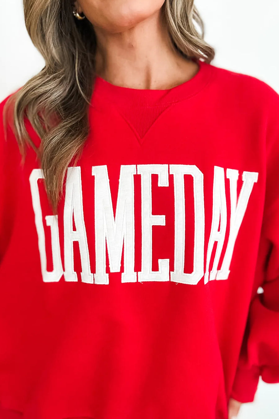 GAMEDAY embroidered patch sweatshirt — flat lay product shot showing full garment