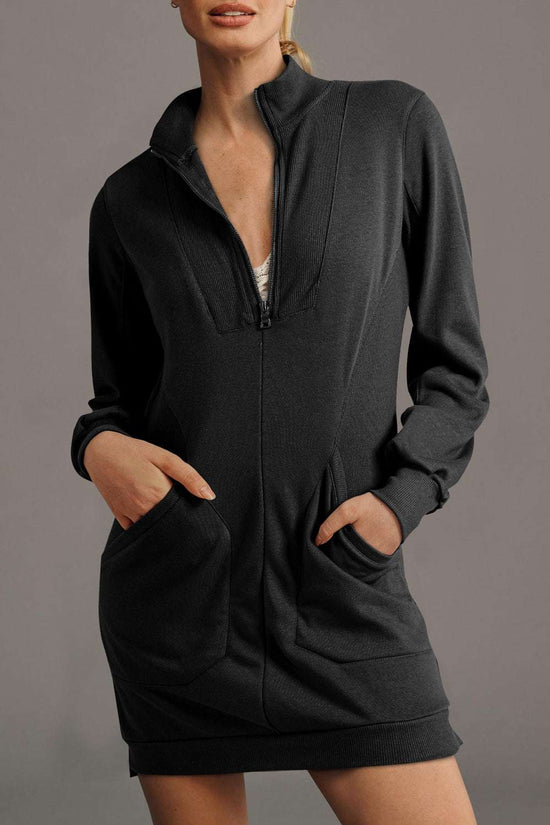 Ladies black zip-up sweatshirt dress with front pockets and ribbed collar, ideal for casual fall fashion from FashionFitz.