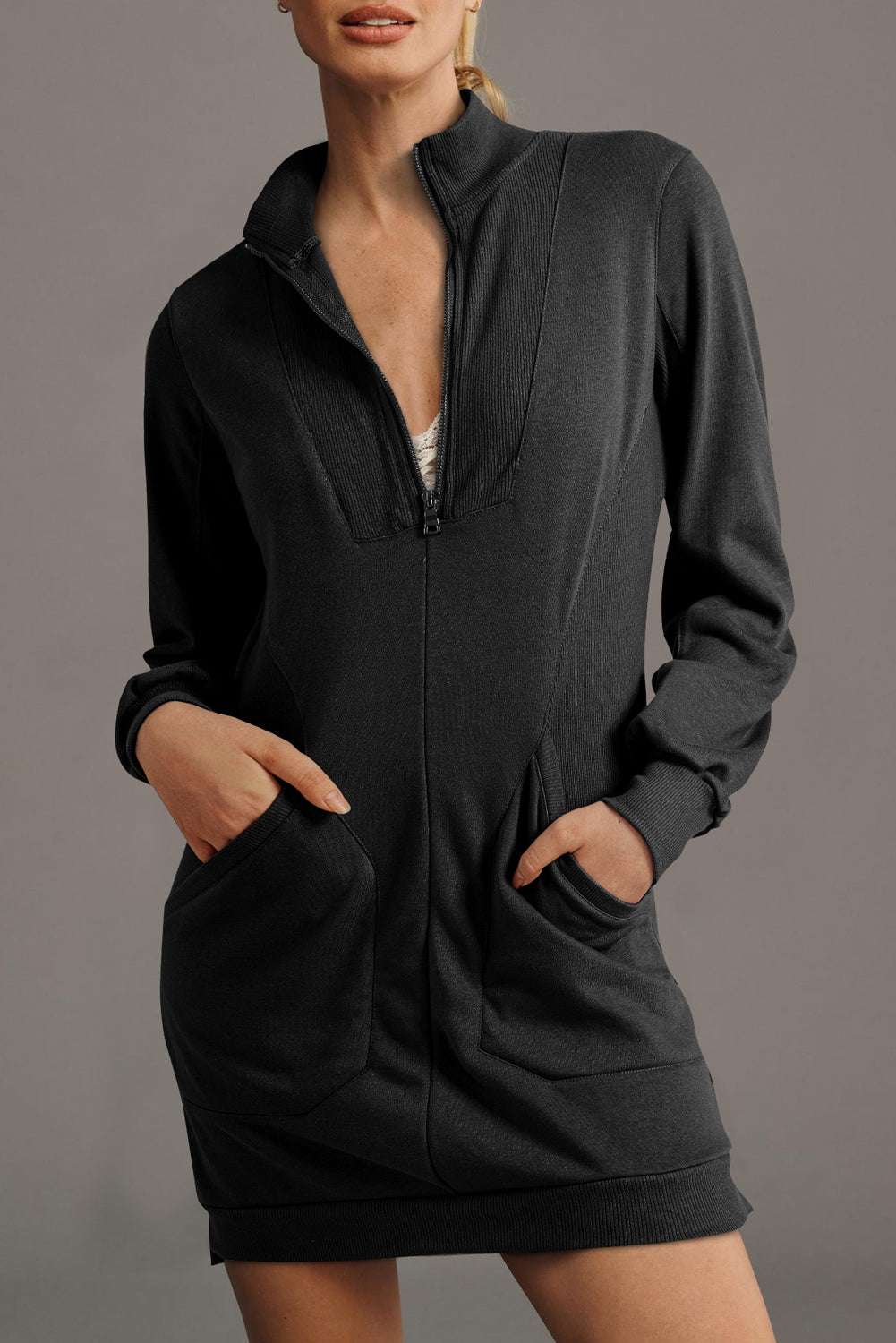 Ladies black zip-up sweatshirt dress with front pockets and ribbed collar, ideal for casual fall fashion from FashionFitz.