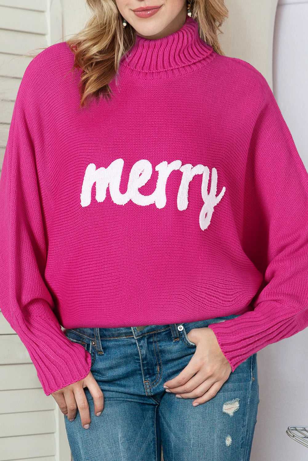 Front view of the Fiery Red High Neck Sweater for a Stylish Christmas, featuring 'merry' print and relaxed fit for festive winter style.