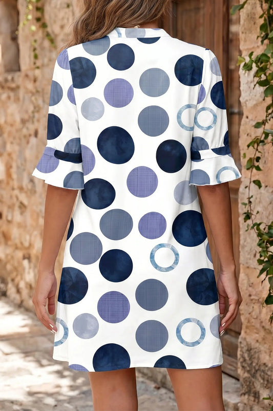 Women's flounced mini dress side view polka dot holiday