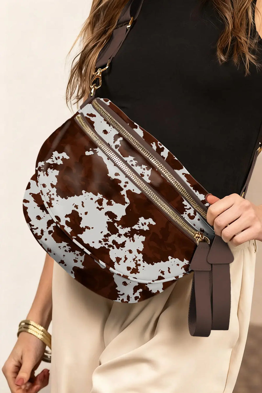Women's cow print crossbody bag open view interior