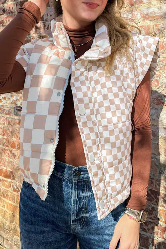 Ladies khaki plaid quilted gilet styled with brown turtleneck and jeans, featuring button and zip closure for versatile winter layering.