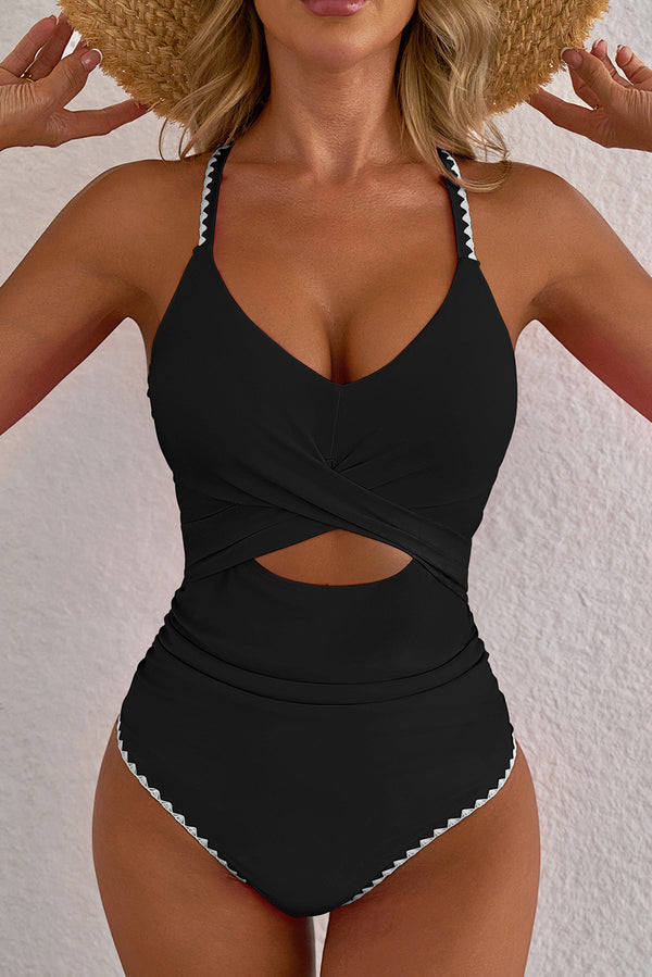 Woman wearing ric rac trim contrasted patchwork cutout one piece swimsuit