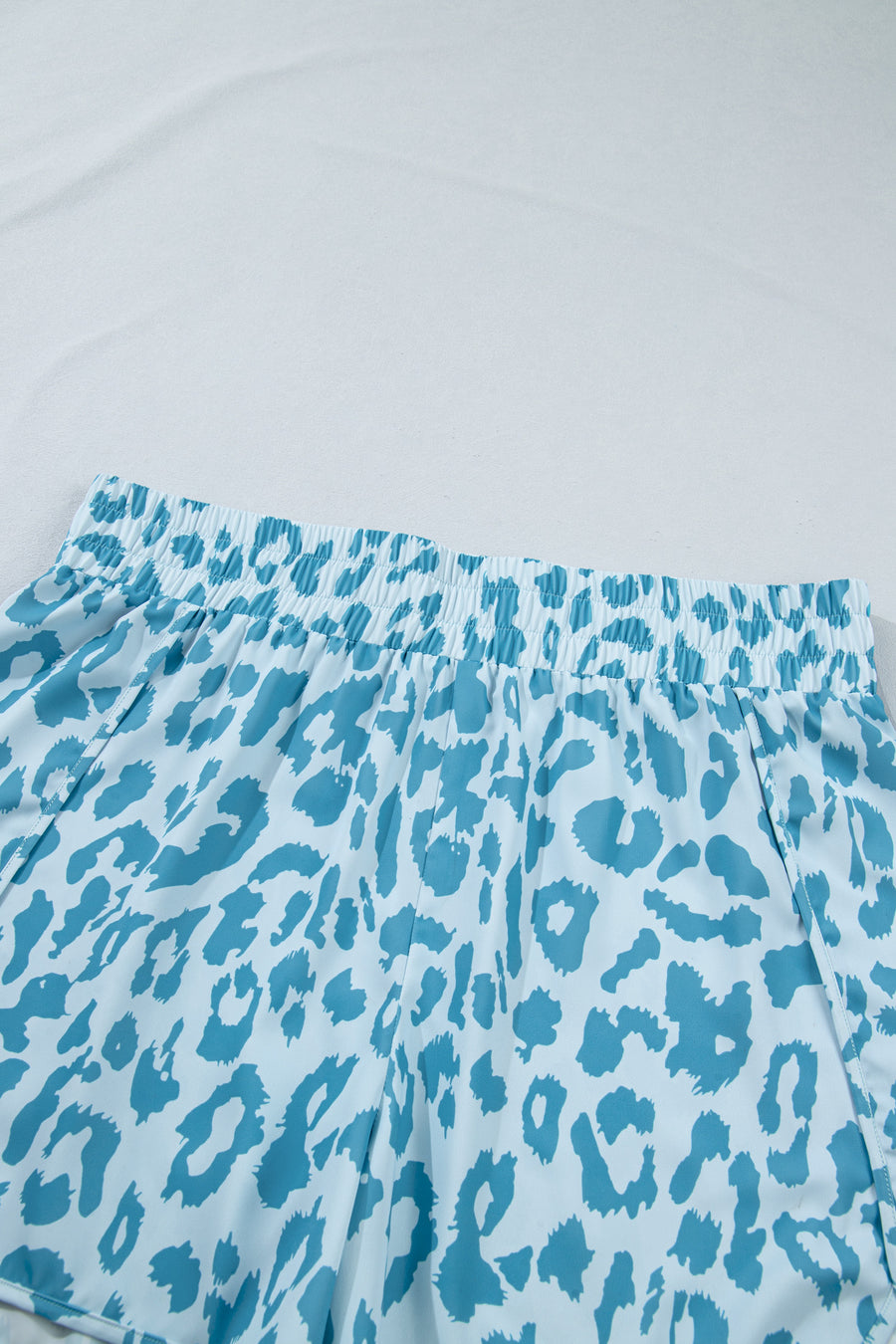 Plus Size Leopard Print Elastic High Waist Athletic Shorts — angled view | Fashionfitz UK