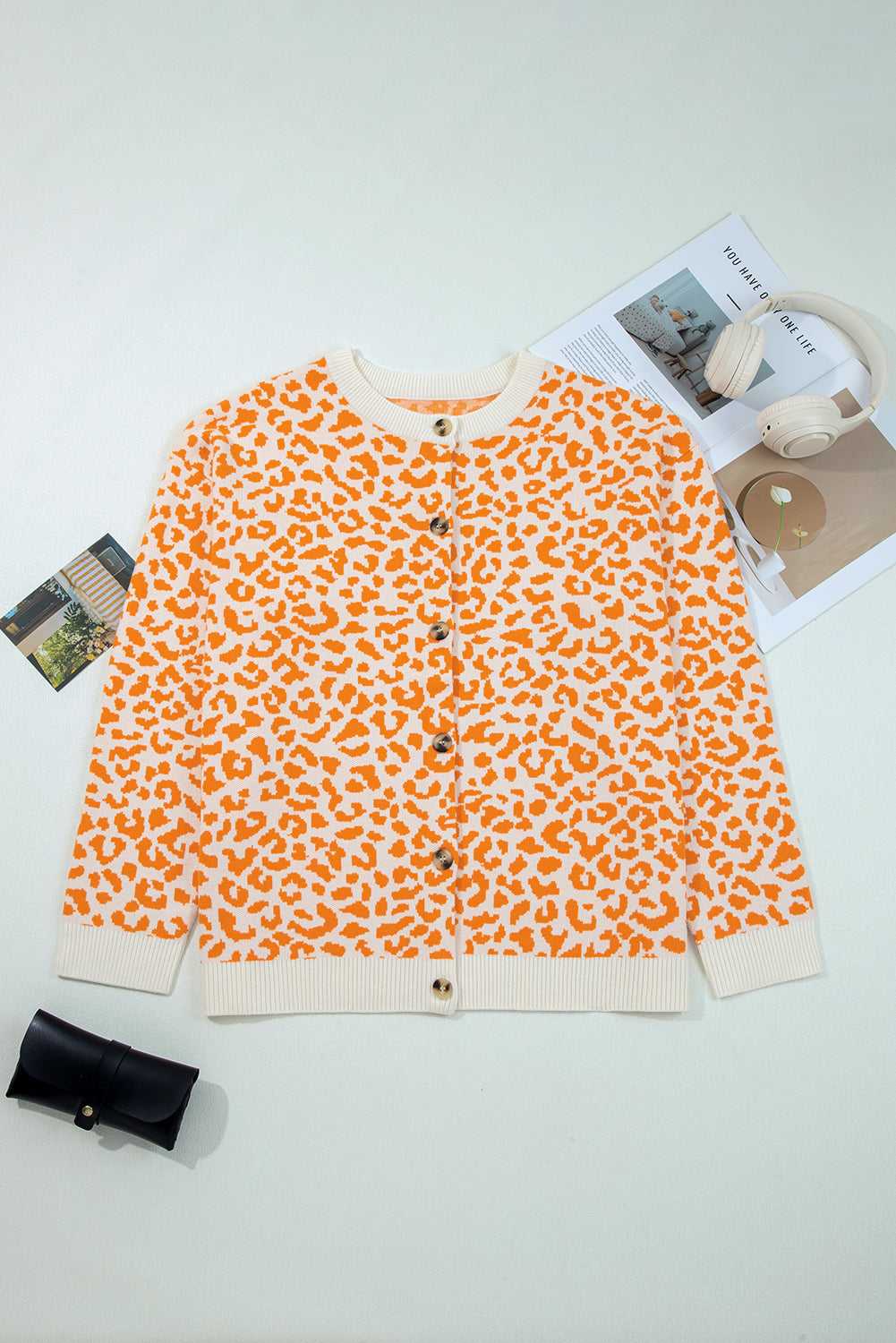 Casual orange leopard jumper with drop shoulders and relaxed fit