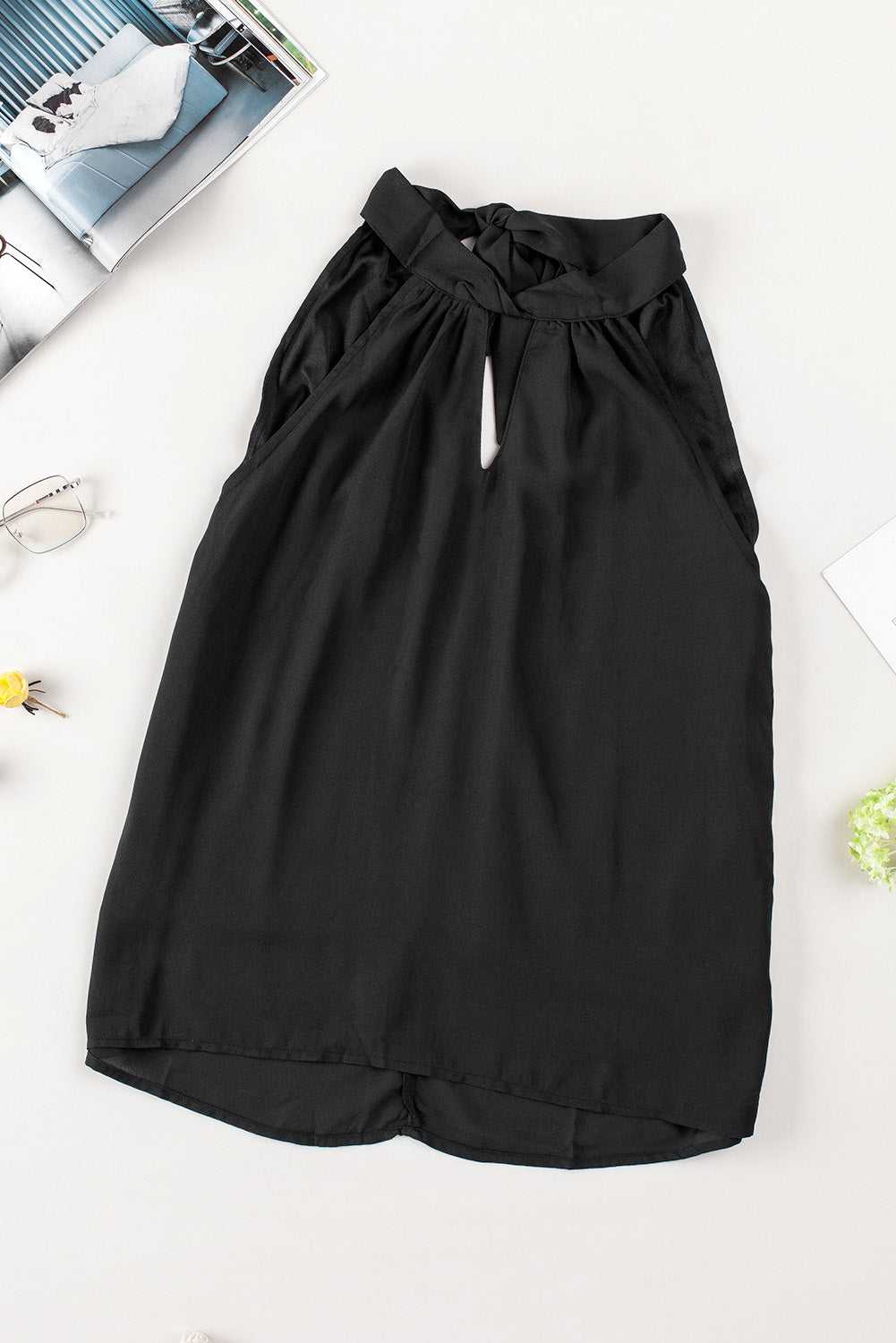 Black keyhole halter tank top for women with sleeveless design and front keyhole detail. Lightweight polyester summer top in elegant solid black.