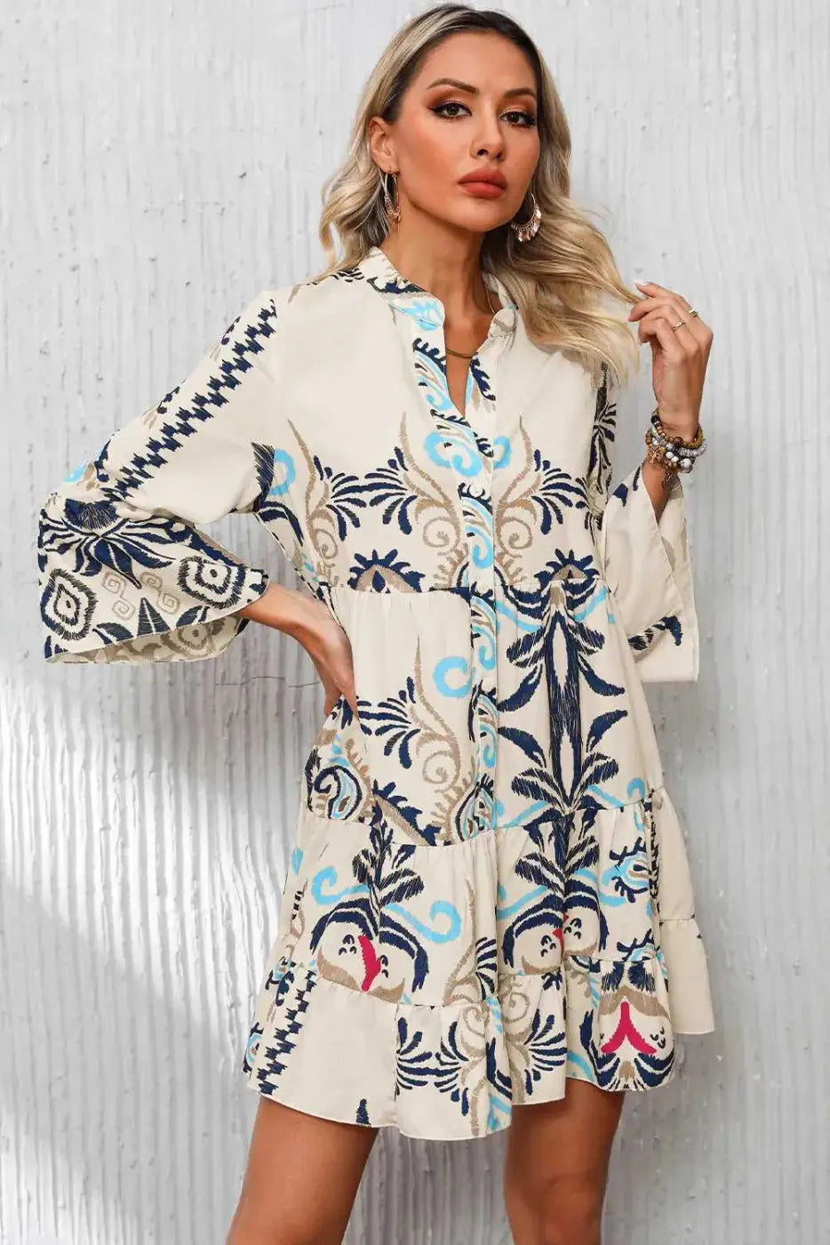 Tribal Mini Dress with Bracelet Sleeves in boho shift style featuring blue, beige, and red ethnic patterns, perfect for spring outings.