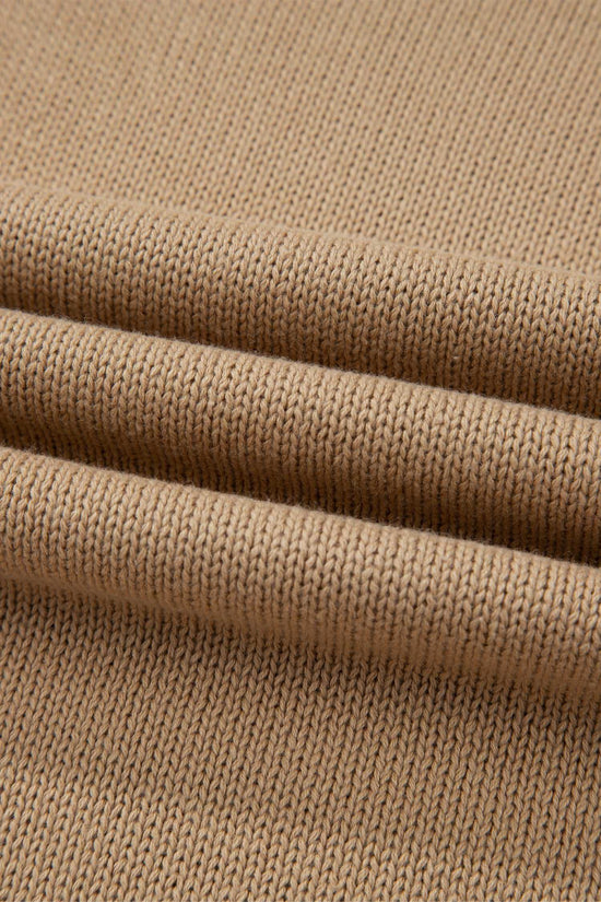 Close-up of beige fabric with a textured pattern