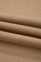 Close-up of beige fabric with a textured pattern