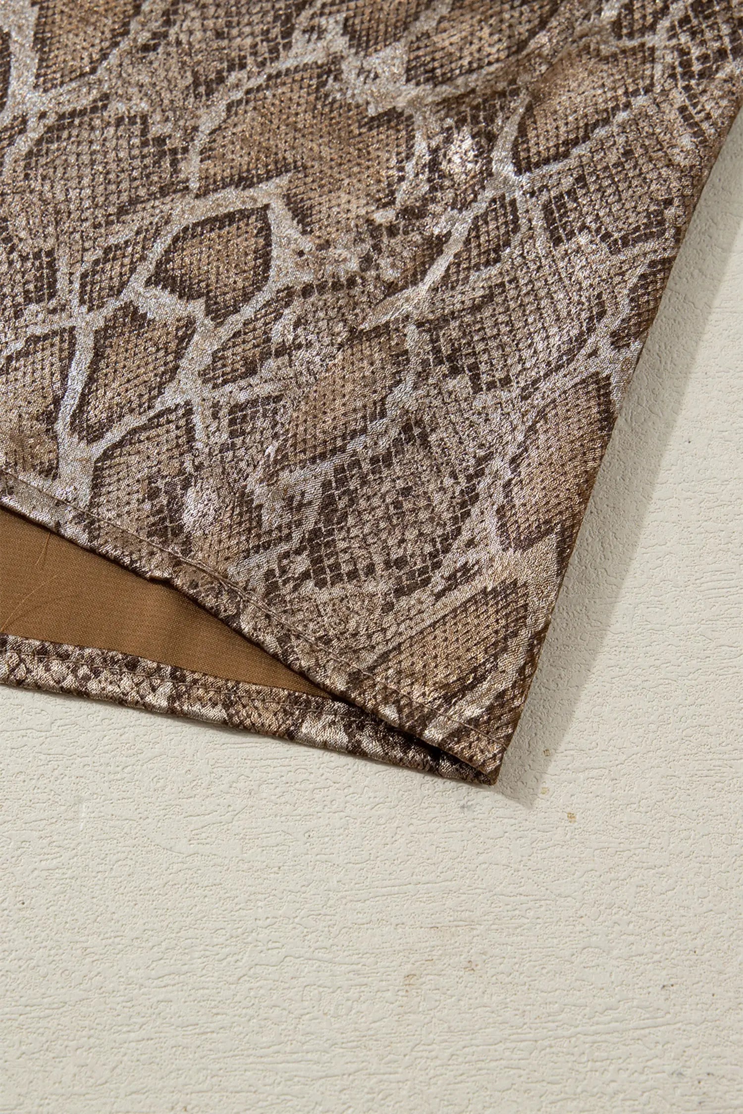 Brown metallic leopard polo blouse — three-quarter view, resort styling | Fashionfitz