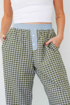 Close-up of Ladies Brown Gingham Boxer Trousers by FashionFitz highlighting the blue waistband, button fly, and soft gingham fabric for daily wear.