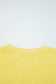 Rear neckline detail of yellow Drop Crop Wide-Leg Pants Set, showcasing ribbed collar for added comfort and durability.