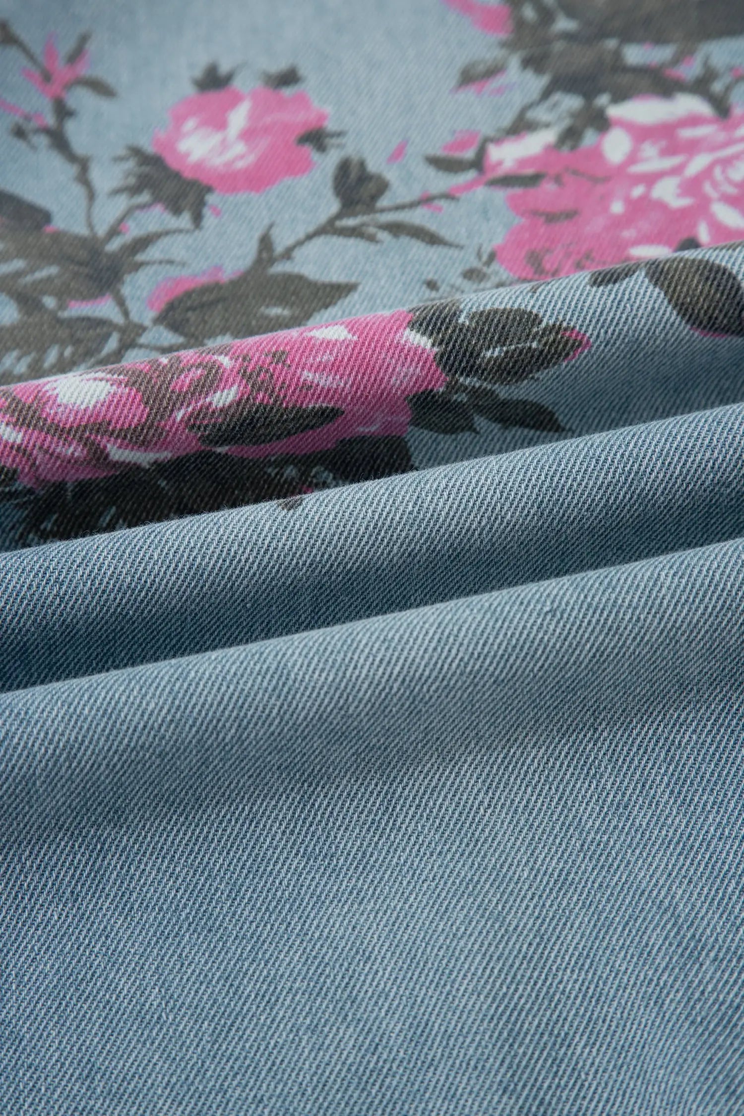 Women's floral print low rise bootcut jeans close-up detail