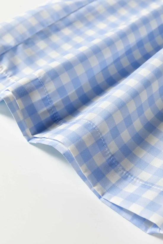 Side seam and hem detail on relaxed fit trousers