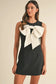 Elegant noir mini dress with bowknot applique