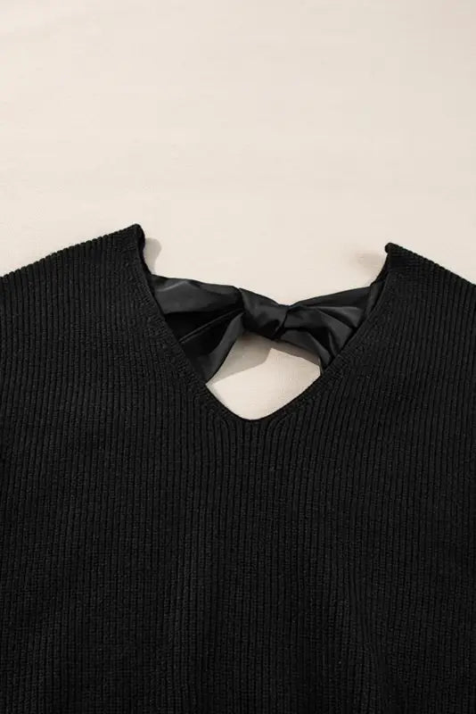 Elegant noir lantern-sleeve sweater | chic v-neck design