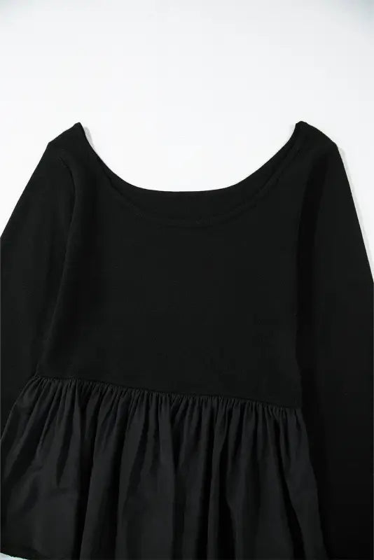 Elegant noir peplum top