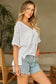 Elegant white v-neck blouse - perfect for any occasion