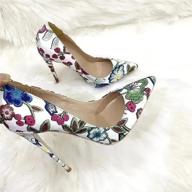 FashionFitz Embroidery Graffiti Party Heels shown on a soft white background. Feminine stiletto shoes with colorful embroidery for special occasions.