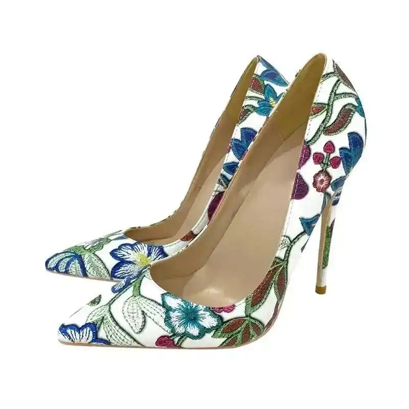 Side angle of FashionFitz Embroidery Graffiti Party Heels with colorful floral design. PU leather stiletto pumps for adult female fashion.