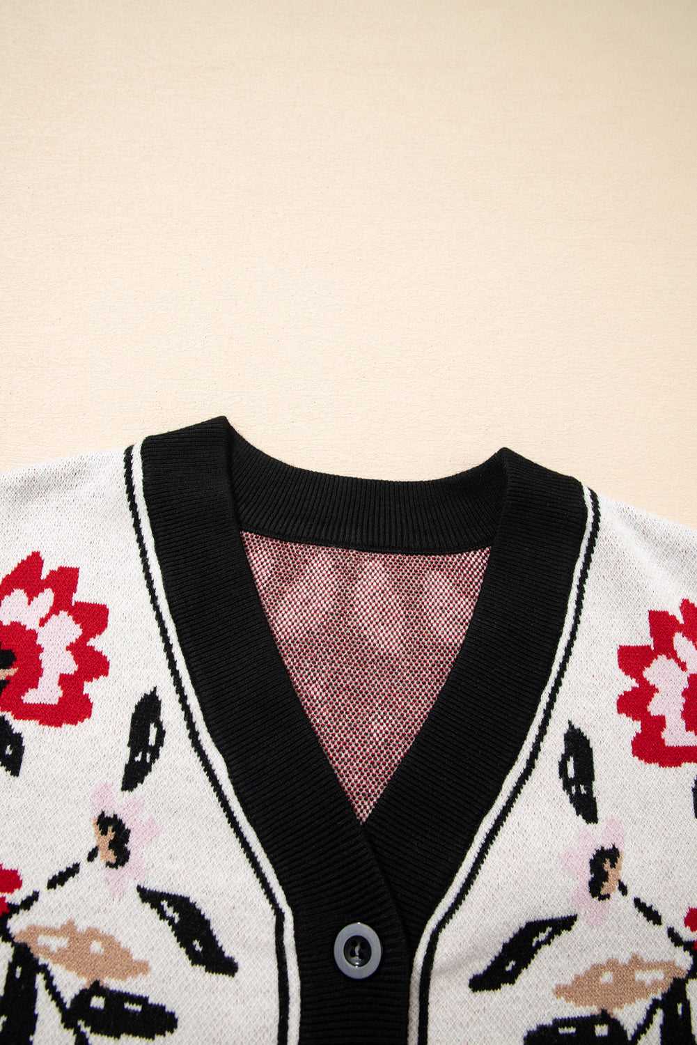 V-neckline detail of stretchable knit cardigan in soft beige