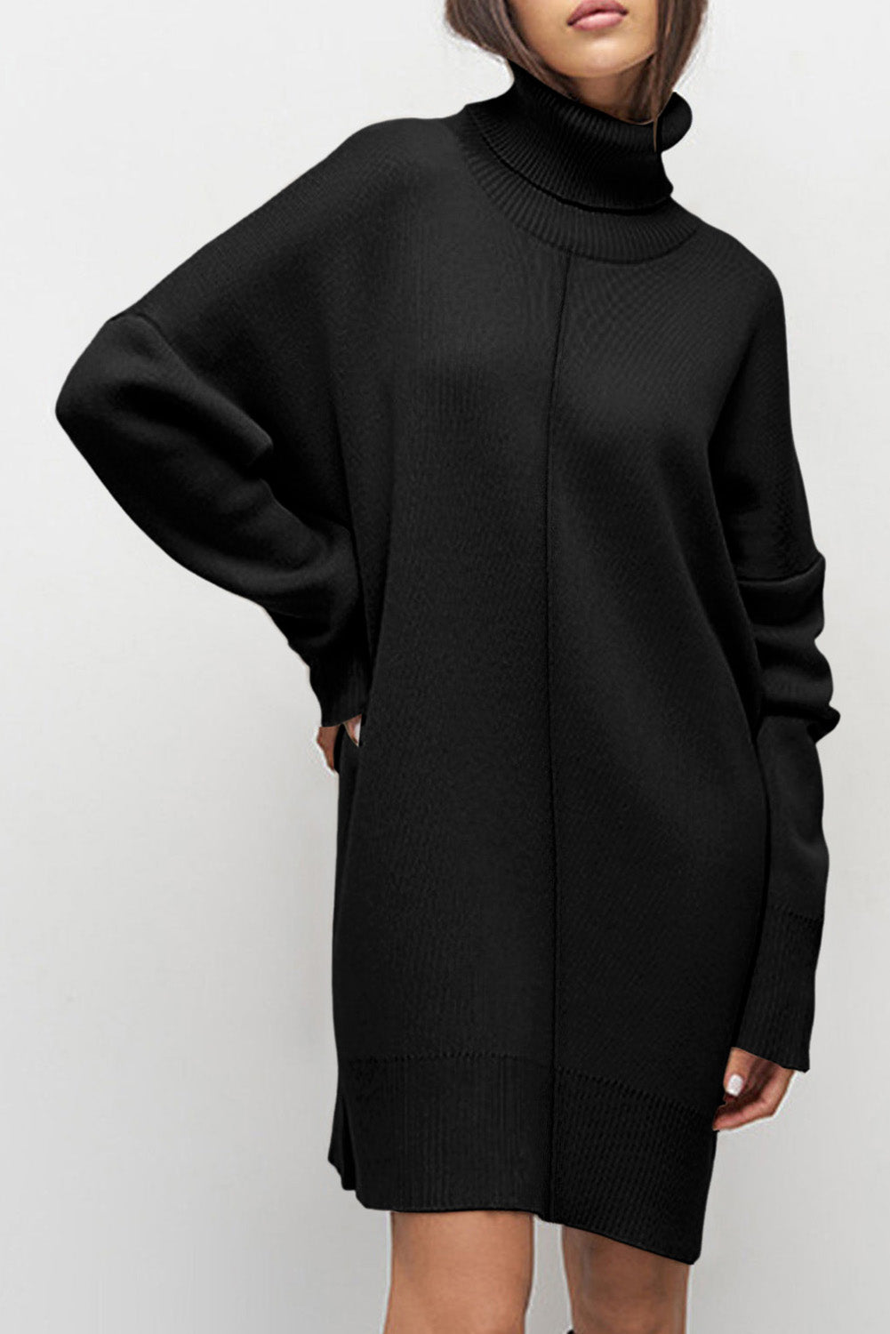 Black Oversized Turtleneck Jumper Dress worn by a person on a white background