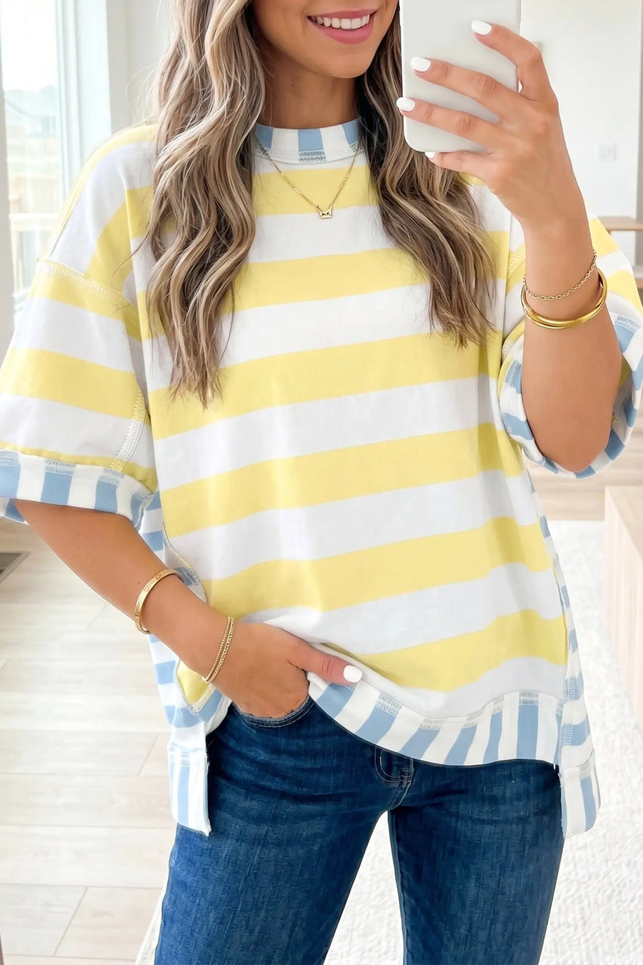 Women's stripe contrast oversized top close-up detail exposed seam