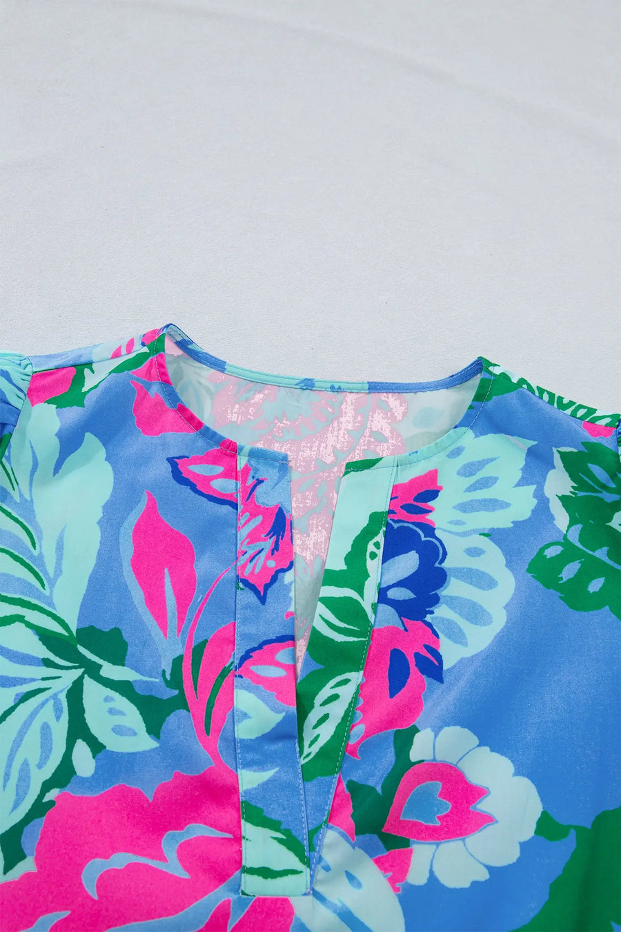 Close-up of Floral Print Balloon Sleeve Tunic Blouse showing vibrant floral print and balloon sleeve gathering — Fashionfitz