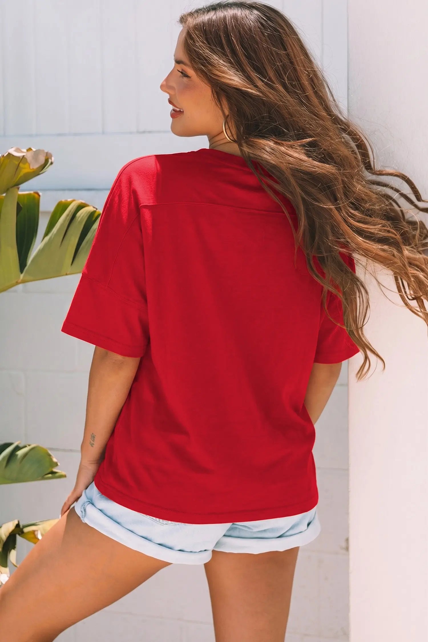 Stars and stripes patchwork detail close-up on red USA embroidery tee | Fashionfitz UK
