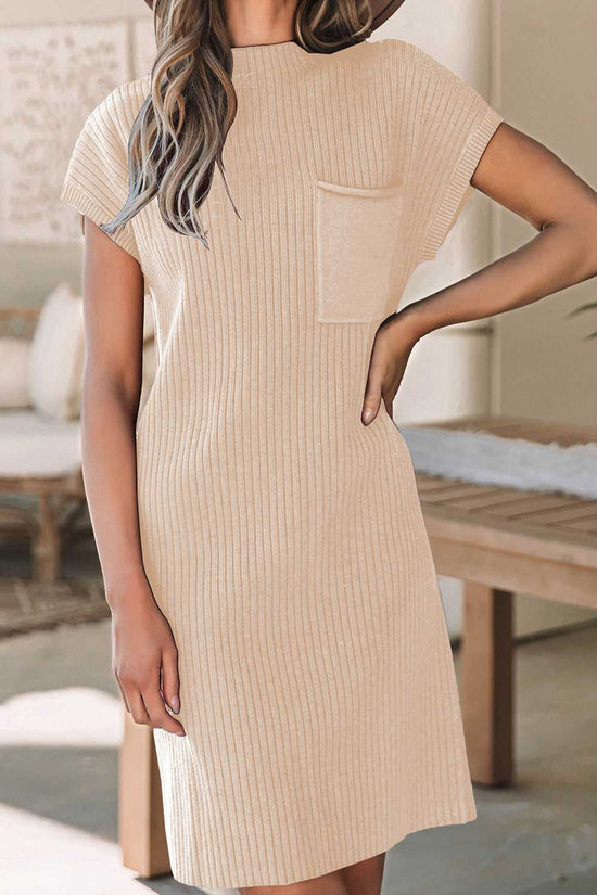 Oatmeal sweater dress in ribbed knit with short sleeves and chest pocket, ideal for cozy winter wear and casual daily outfits.