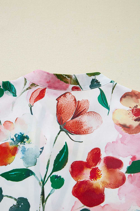 Close-up of back collar on Floral Shift Dress highlighting the vivid floral print and soft fabric texture.