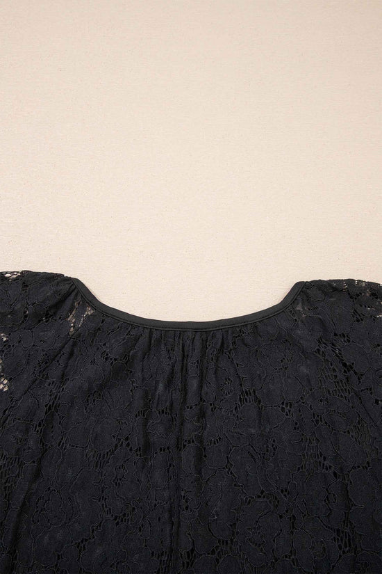 Back neckline detail of the Black Lace Overlay Maxi Sundress showing gathered lace design and smooth finish for a relaxed summer look.