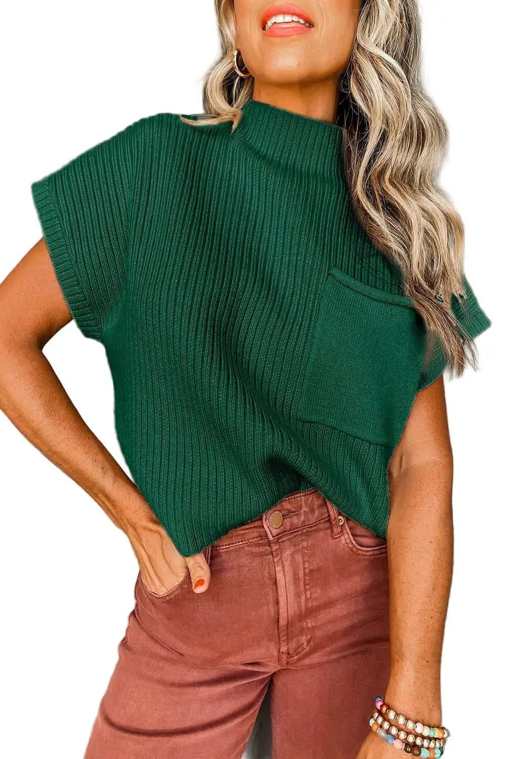 Ribbed Knit Short Sleeve Sweater in green with chest pocket, styled with high-waisted rust pants for a casual chic look.