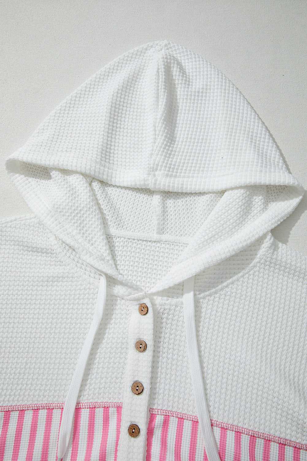 Hood detail of Curve Pink Leopard Stripe Waffle Hoodie for Women featuring drawstrings and textured waffle knit in a cozy plus size design.