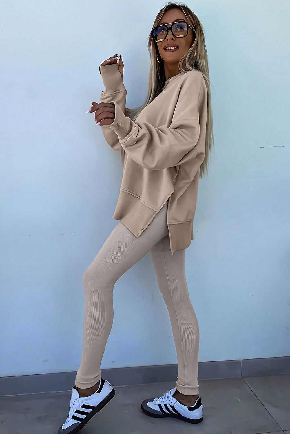 Side view of beige Oversized Sweatshirt and Leggings Matching Set, styled for a relaxed and stylish daily outfit with a cozy fit.