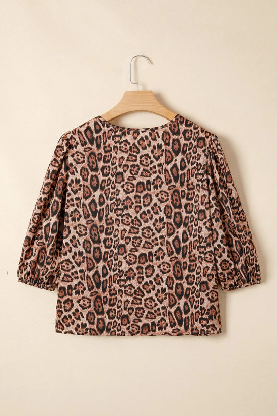 Close-up of brown leopard print fabric detail on puff sleeve bow neck blouse Fashionfitz UK