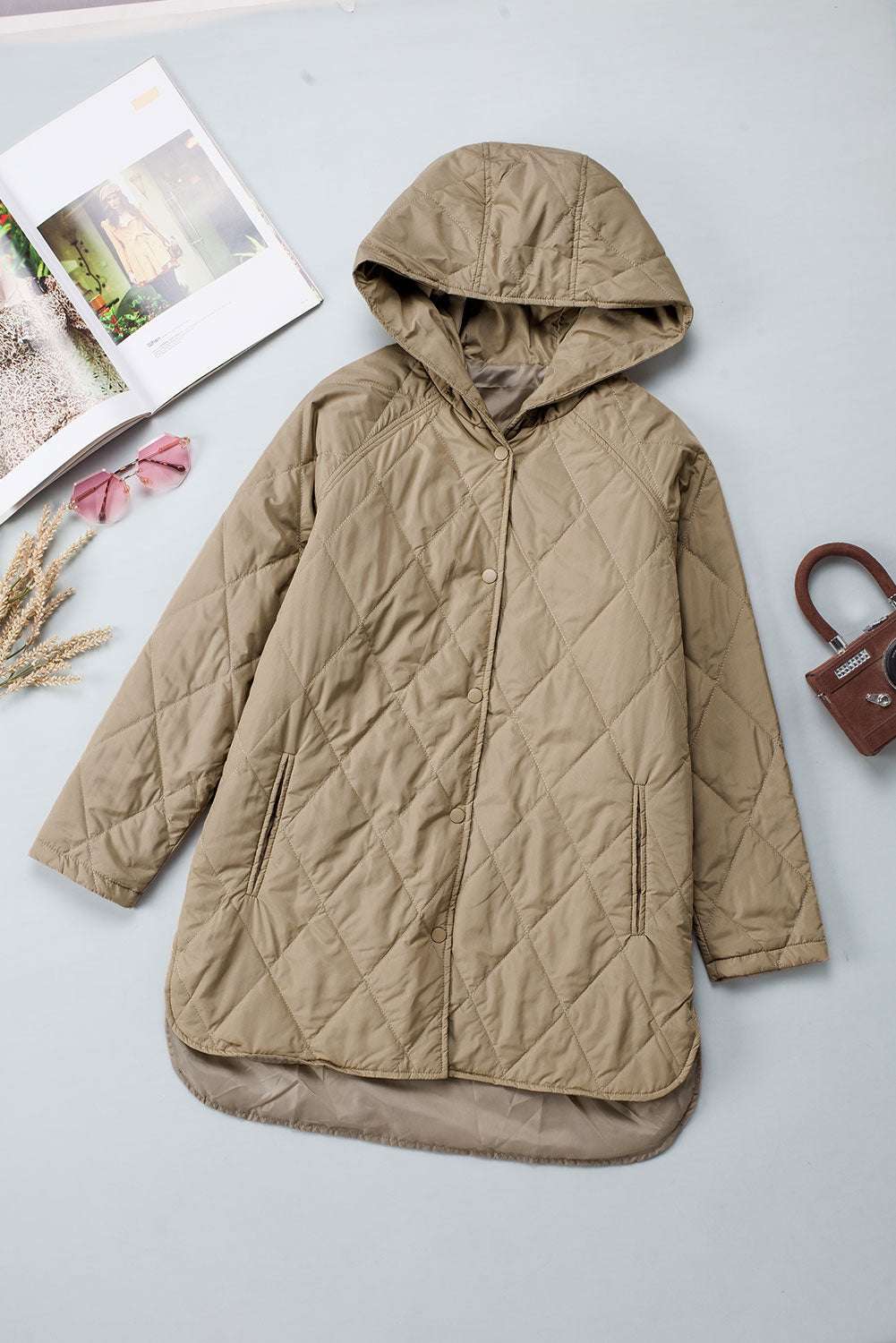 Flat lay of Khaki Quilted Puffer Jacket – Hooded Snap Button Coat with front snap buttons and hood, showcasing lightweight quilted design.