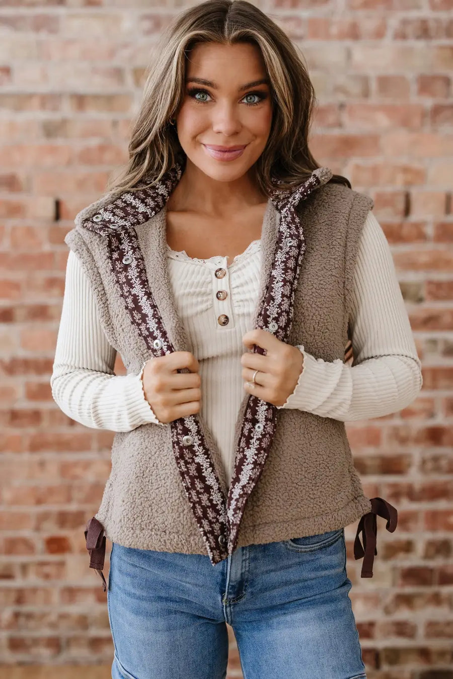 Front view of model wearing Women's Country Borg Fleece Gilet Winter Vest FashionFitz with floral trim and cozy sherpa fleece.