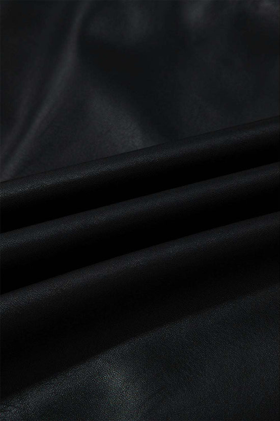 Fabric texture of Black Vegan Leather Sleeveless Mini Dress, showing soft, cruelty-free PU leather ideal for fall fashion.