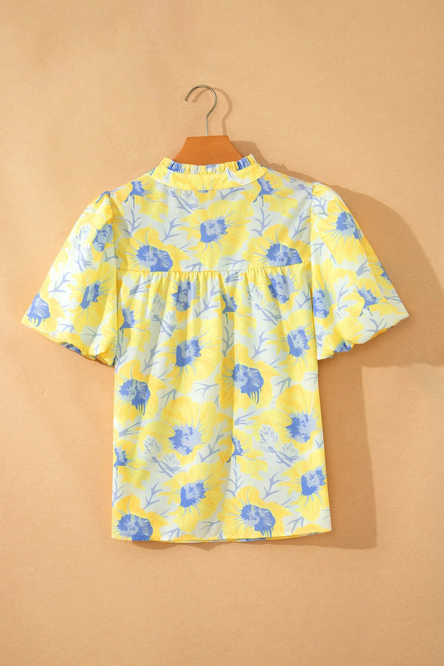 Women's floral jacquard bubble sleeve blouse flat lay casual