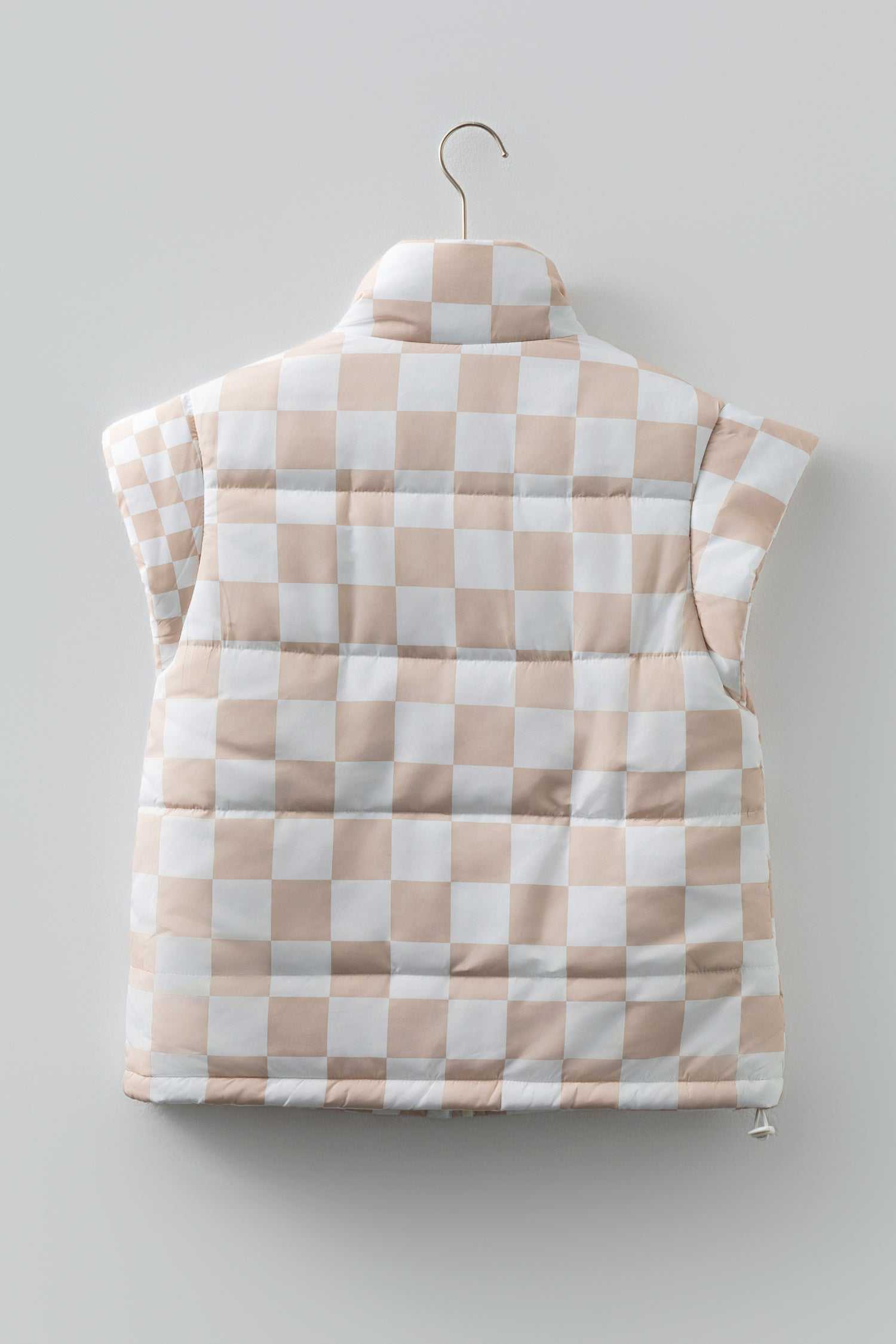 Back view of khaki plaid quilted gilet showing padded design and checkered print, ideal for layering in cold weather.