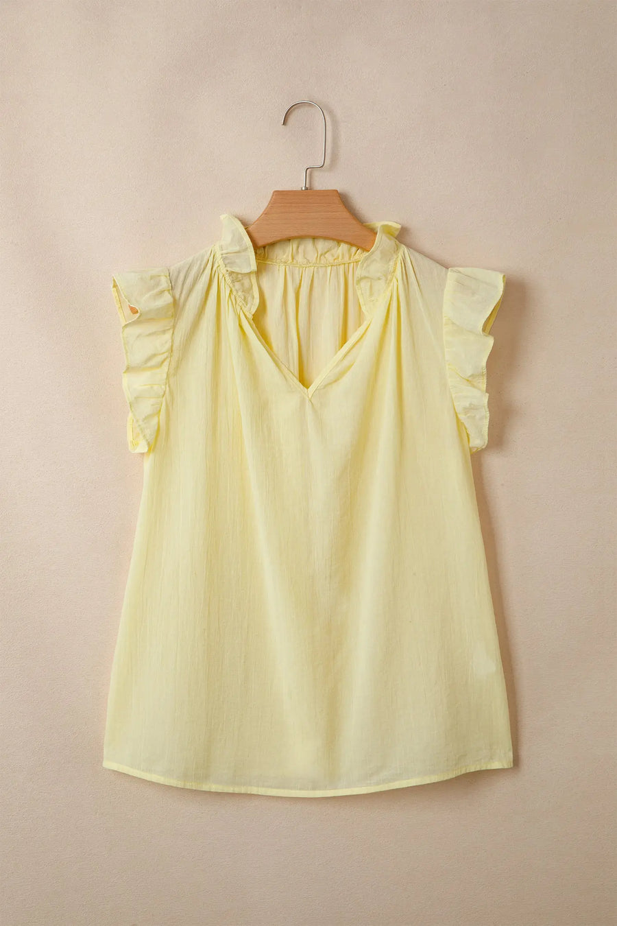 Cotton linen shift top — back view, relaxed sleeveless silhouette