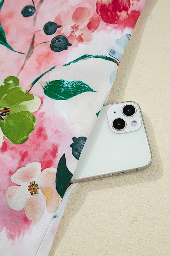 Close-up of pocket detail on Floral Shift Dress - Casual Elegance, showing vibrant multicolor floral print and smartphone fit.