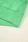 Ribbed hem detail of green Drop Crop top, highlighting quality stitching and casual loungewear style.
